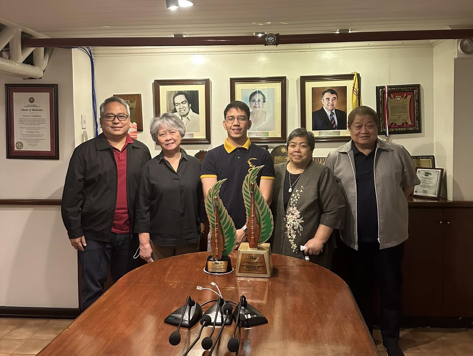 Conductor for award-winning UM Chorale pays courtesy visit to UM top officials