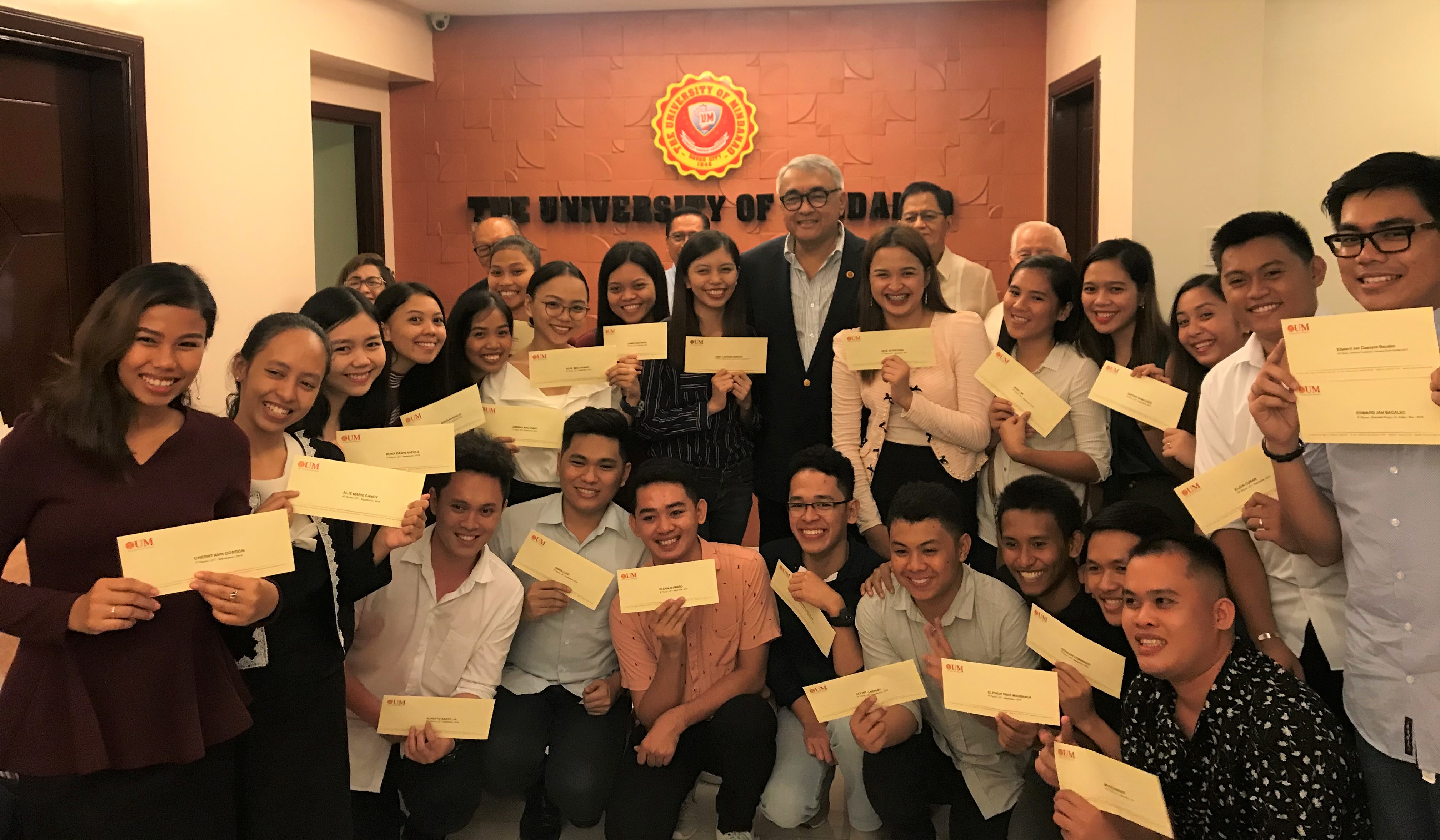 25 topnotchers receive awards from Dr. Torres and UM Board of Trustees